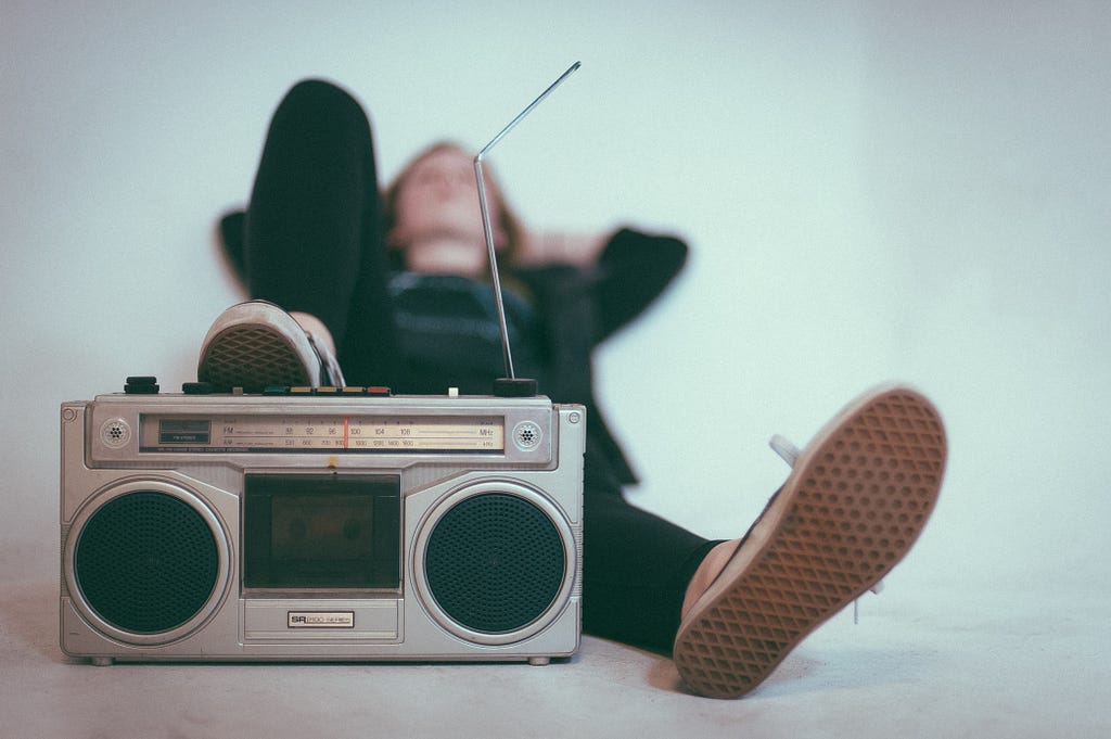 Man at peace while listening to music