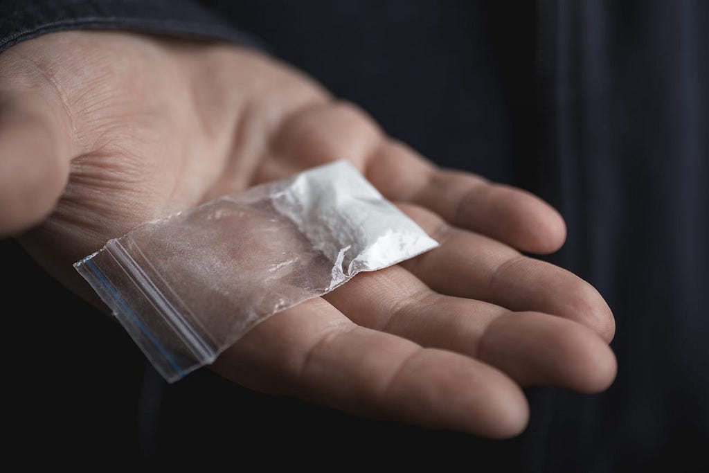 A drug in powder form in a bag.