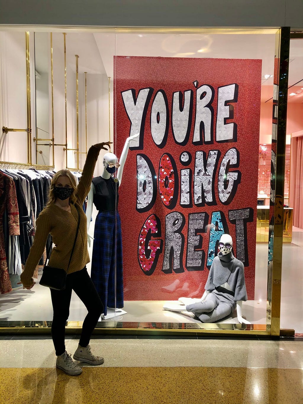 A sign in a mall reads, ”You’re doing great.”