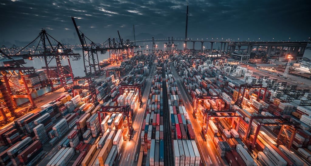 A mess of containers in a shipping yard.