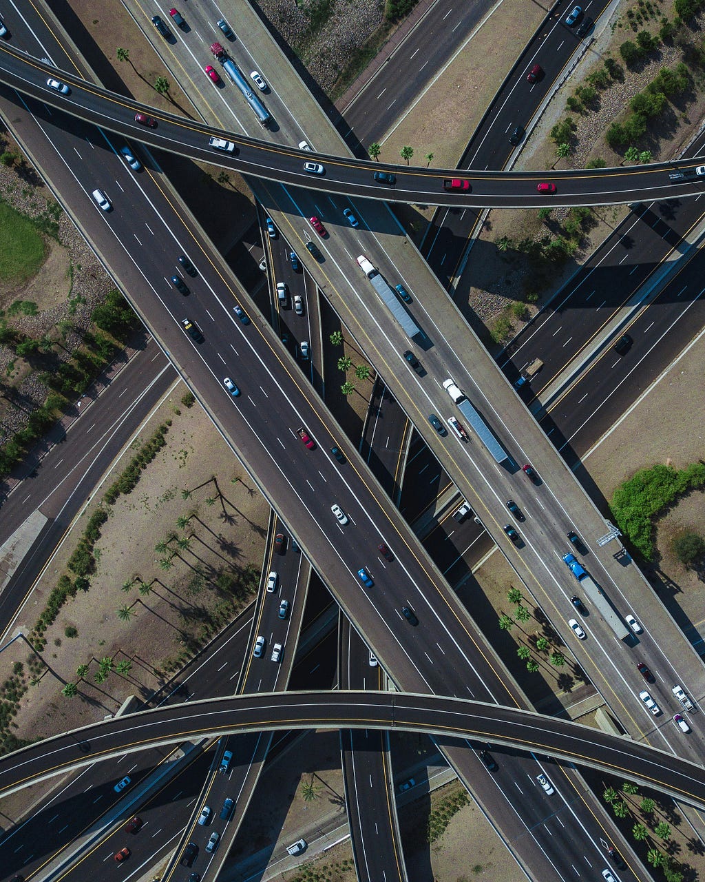 Many cars on a highway.