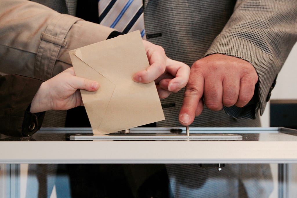 A voter casting their vote