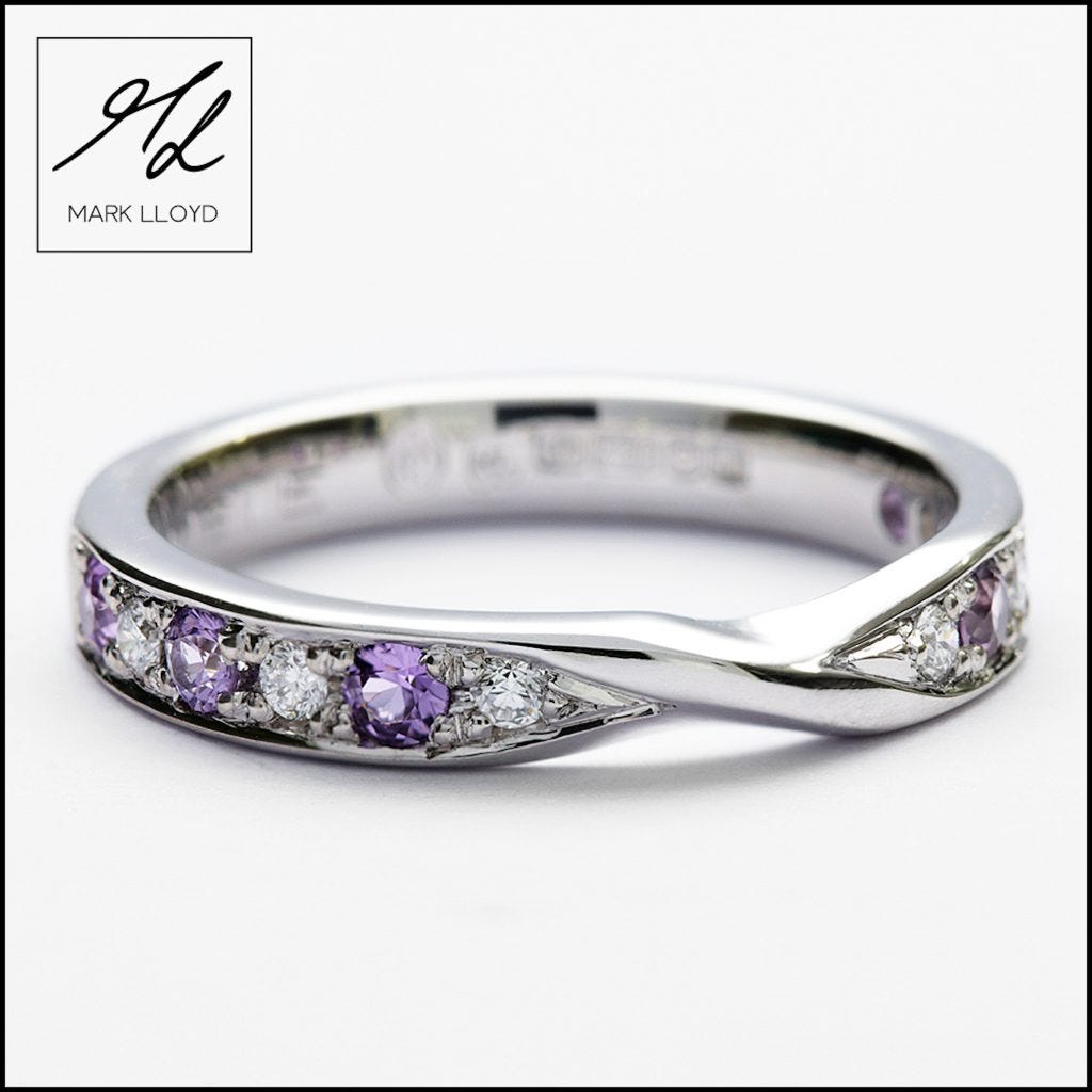 Picture of a shaped to fit wedding ring with pave set diamonds and purple sapphires by Mark Lloyd Master Goldsmith