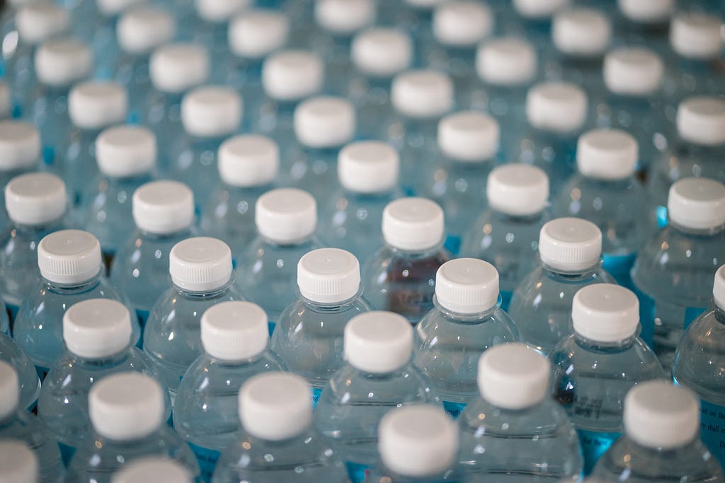 An assembly line of plastic water bottles