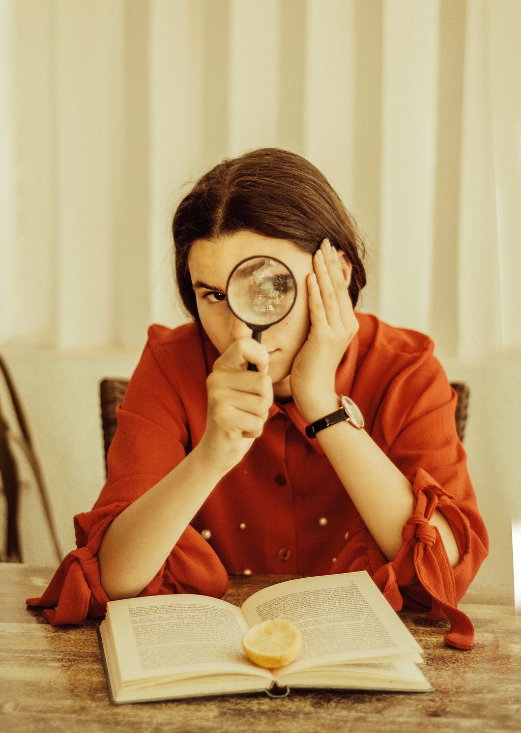 woman with magnifying glass