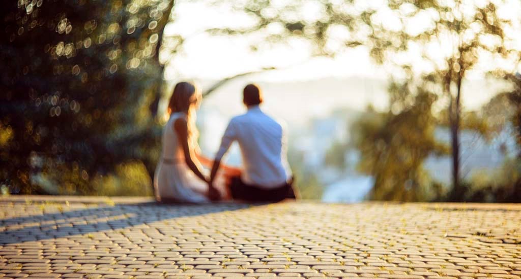 Entrepreneurs in love holding hands in the park