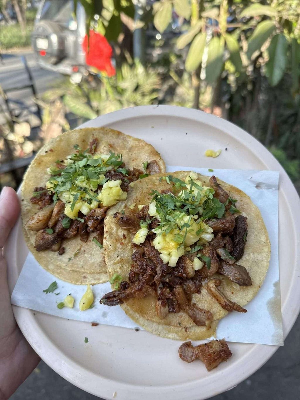 tacos al pastor with pineapple and cilantro