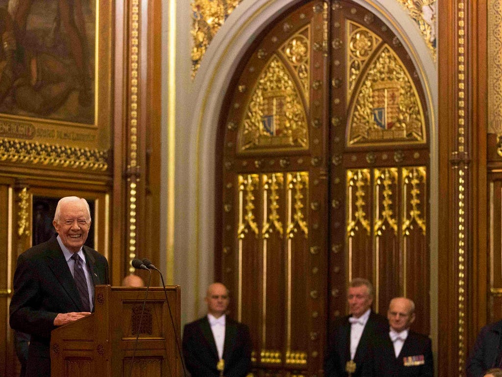 Carter delivers a lecture on the eradication of the Guinea worm, at the House of Lords in London on February 3, 2016.