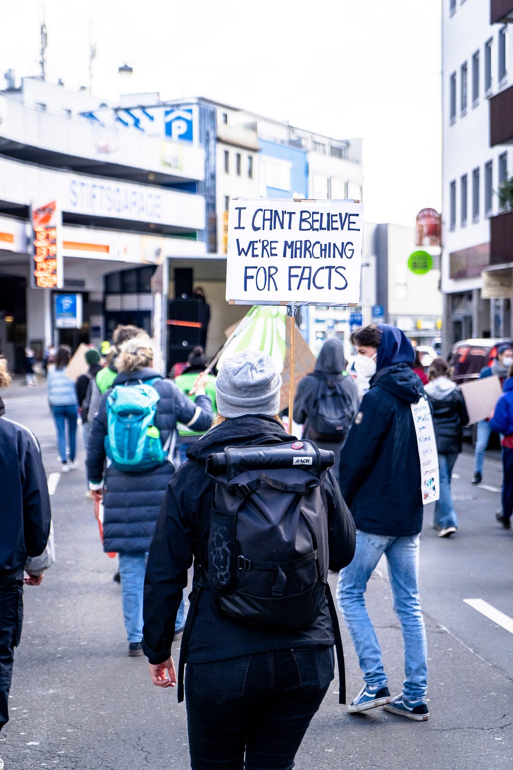 people marching for facts