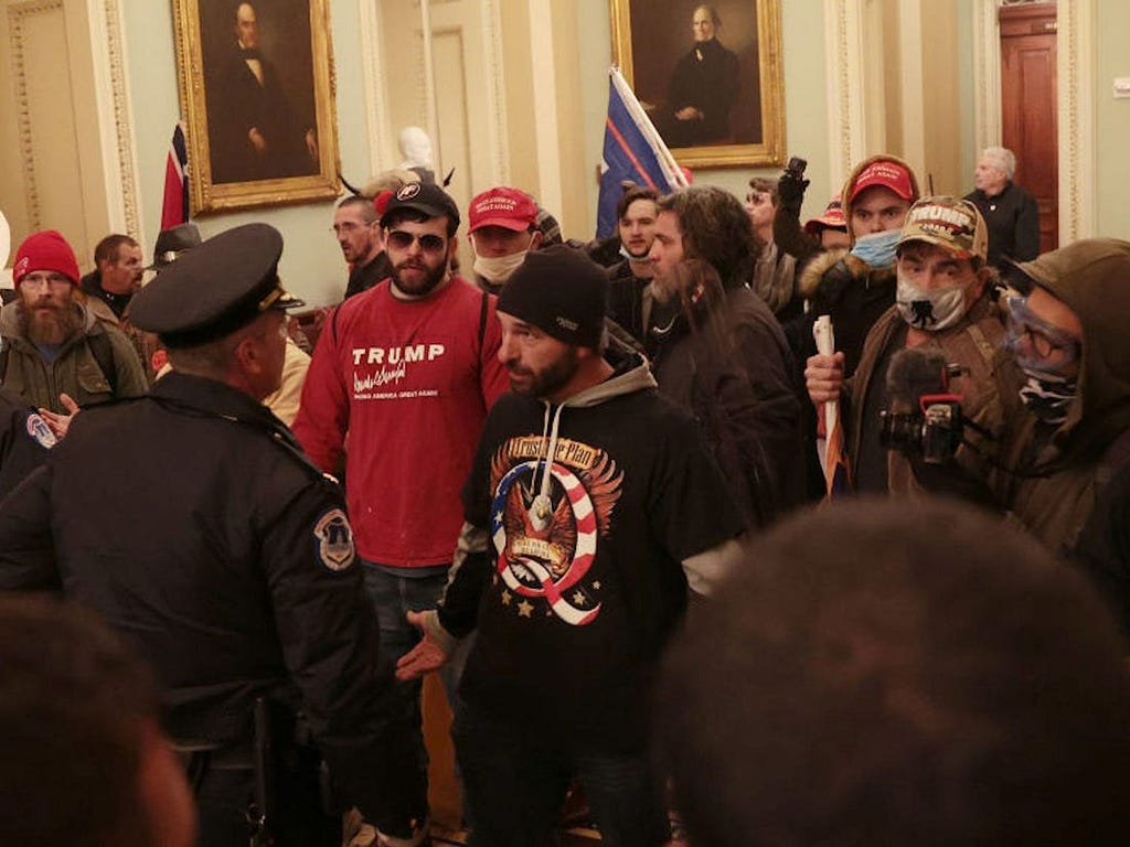 Protesters interact with Capitol Police inside the U.S. Capitol Building on January 06, 2021 in Washington, DC.