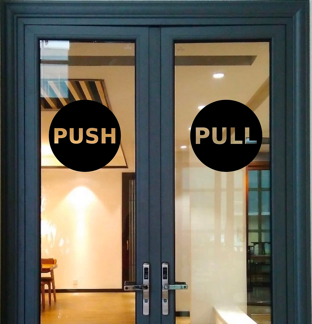A double door with “push” and “pull” labels.
