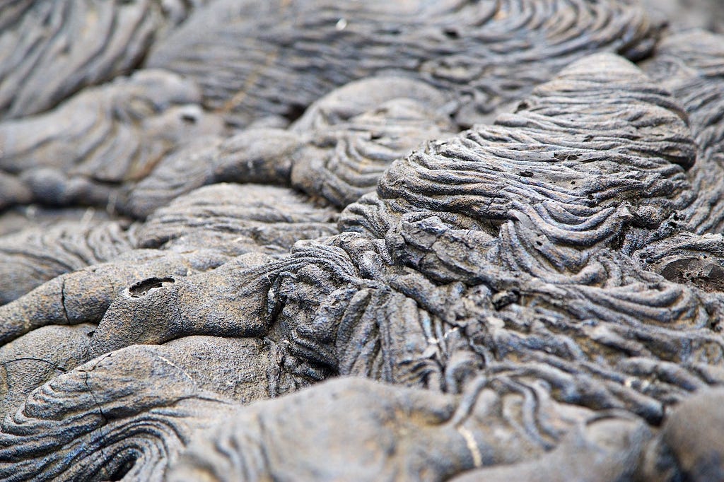 Photos Of The Galápagos Image: Interesting formations on the ground. Is this the cause of the sea or an old lava flow?