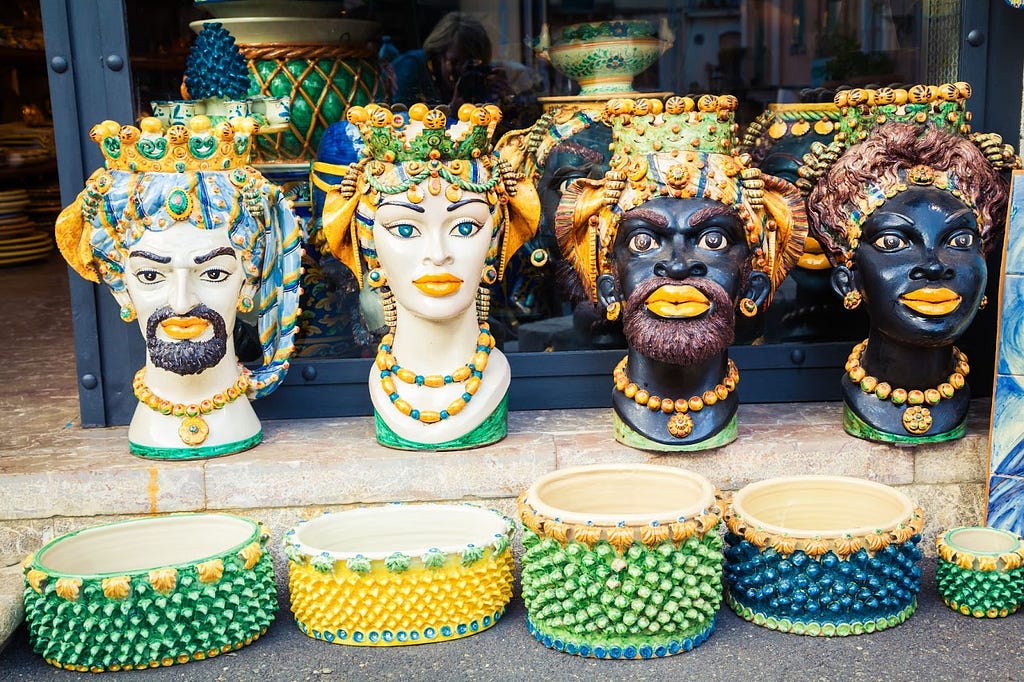 Pairs of teste di moro sold as souvenirs in Sicily.