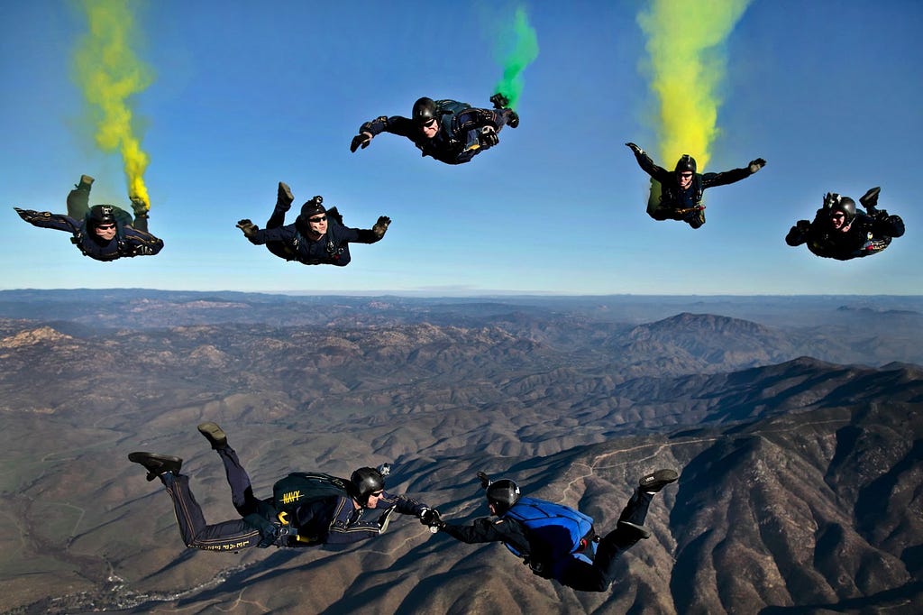 Skydivers on air