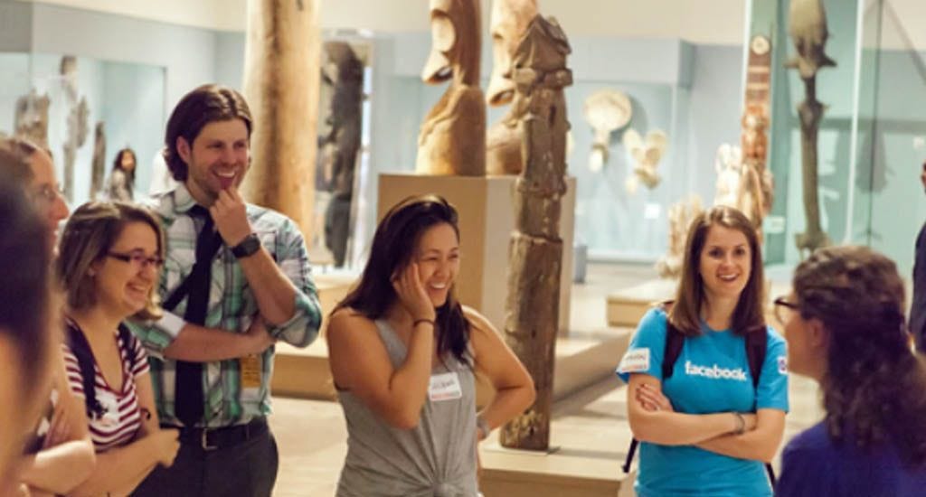 Group of coworkers at museum tour