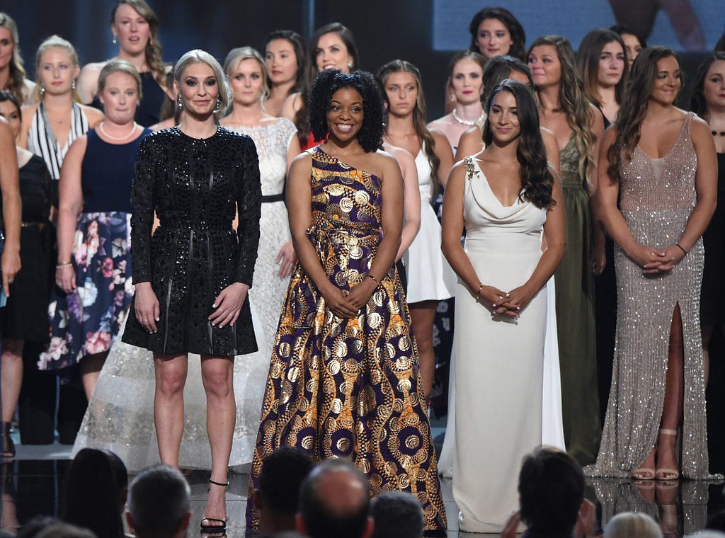 Sarah Klein, former Michigan State softball player Tiffany Thomas Lopez, and gymnast Aly Raisman, from left in front, at the ESPY Awards in 2018.