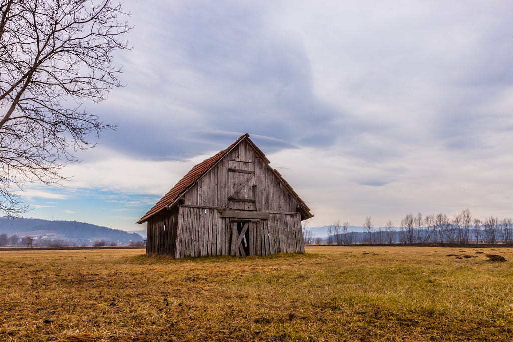 A barn in a field
