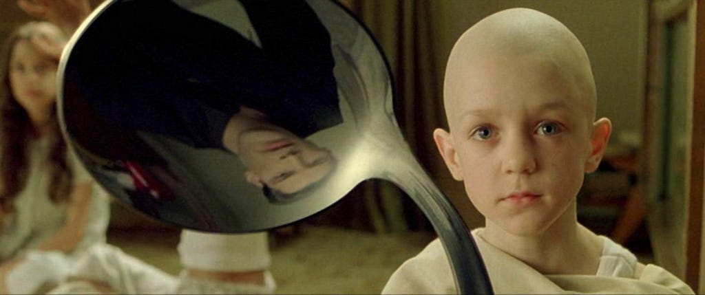 A scene from the film: The Matrix where the psychic boy bends a spoon with his mind for Neo to show the truth, that there is no spoon.