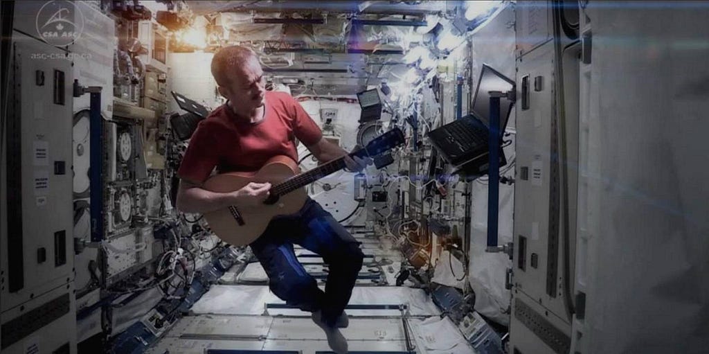 Chris Hadfield, singing David Bowie’s Space Oddity onboard the ISS.