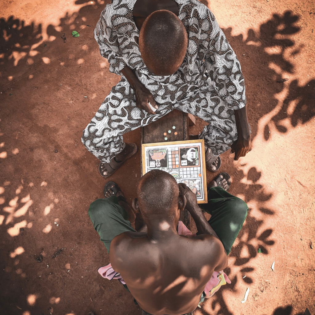 Aerial view of two men playing a board game