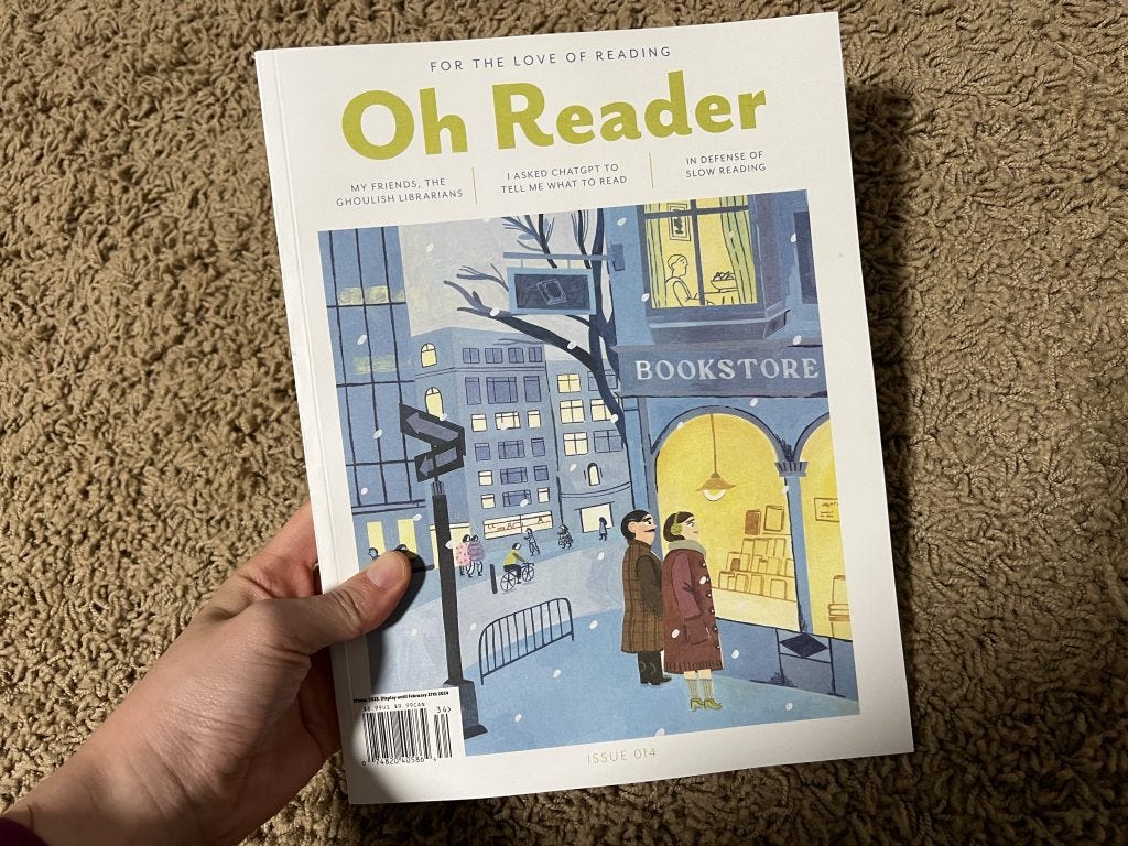 hand holding issue 014 of Oh Reader magazine