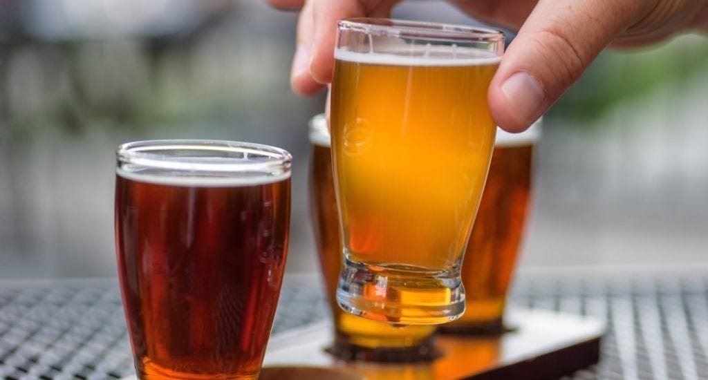 Entrepreneur grabbing alcohol-free beer at office party