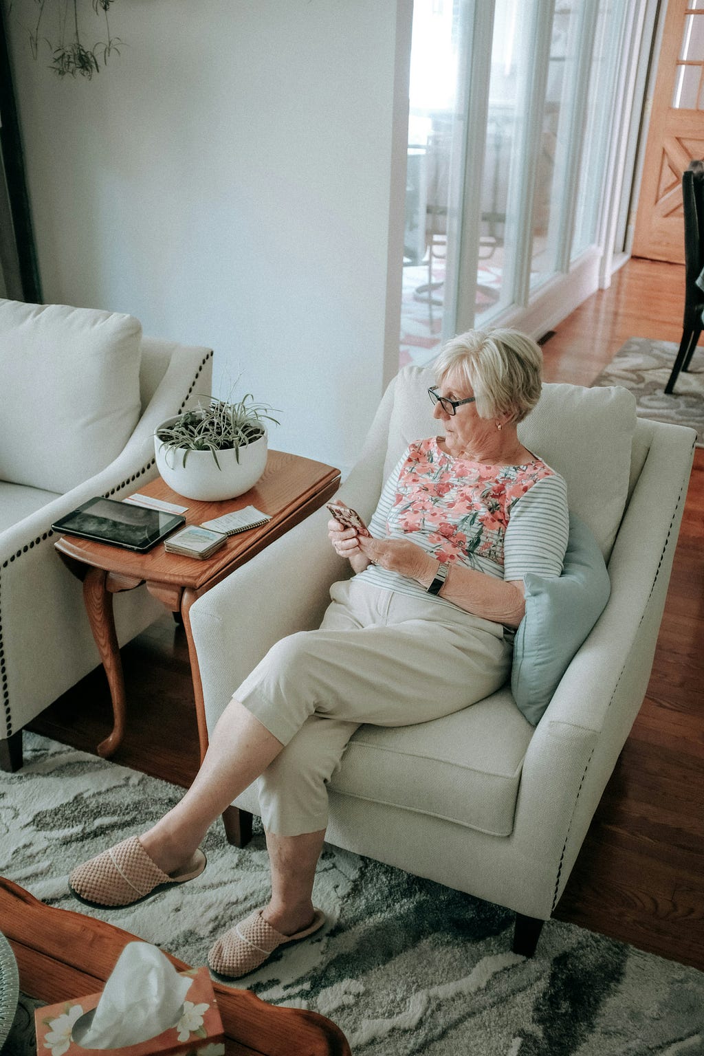 senior woman relaxing with cell phone
