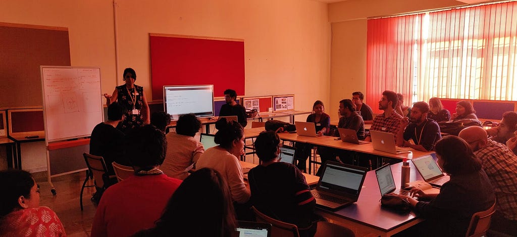 Participants in the “ Generative Futures” workshop working on their laptops