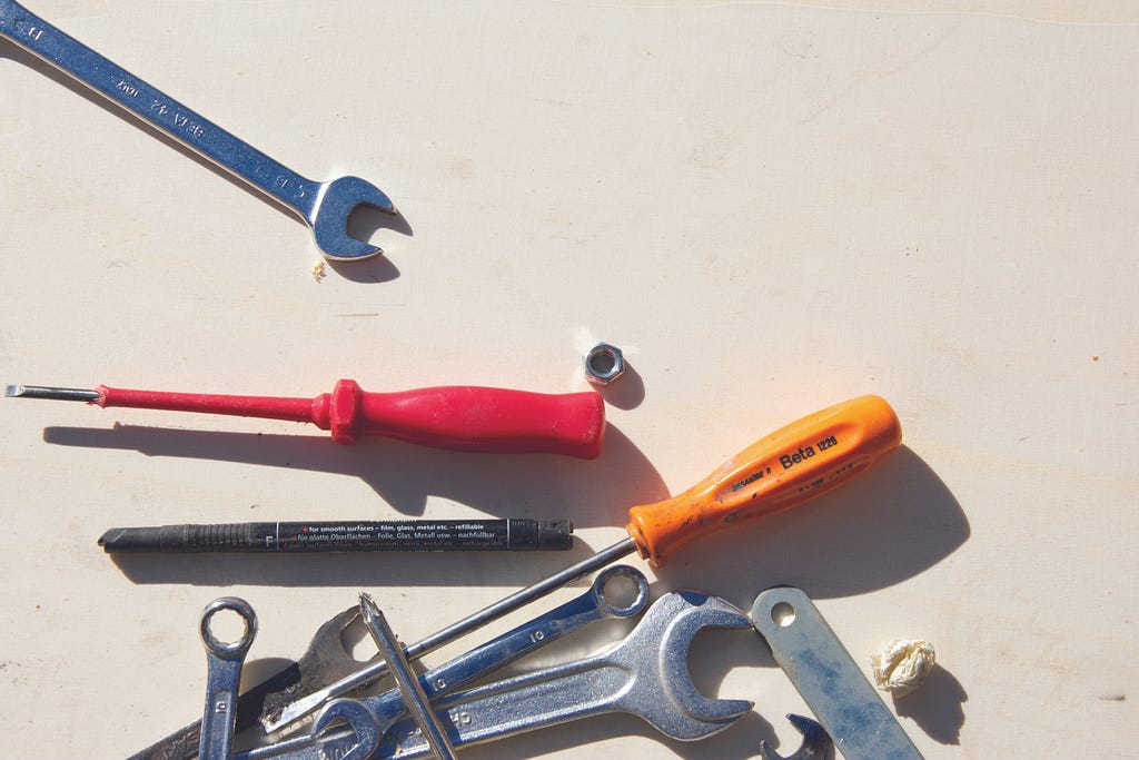 Common tools on a workbench.