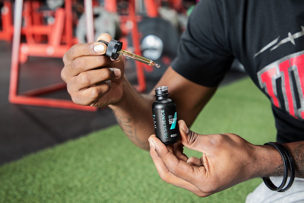 Athlete using CBD for its anti-inflammatory effects