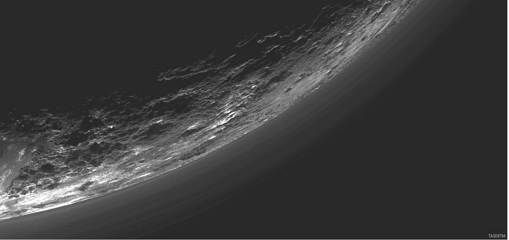 A backlit view of Pluto’s limb as New Horizons looks back after closest approach.