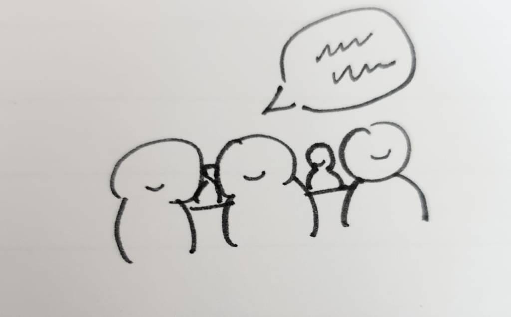 A handrawn cartoon with people sitting in an audience