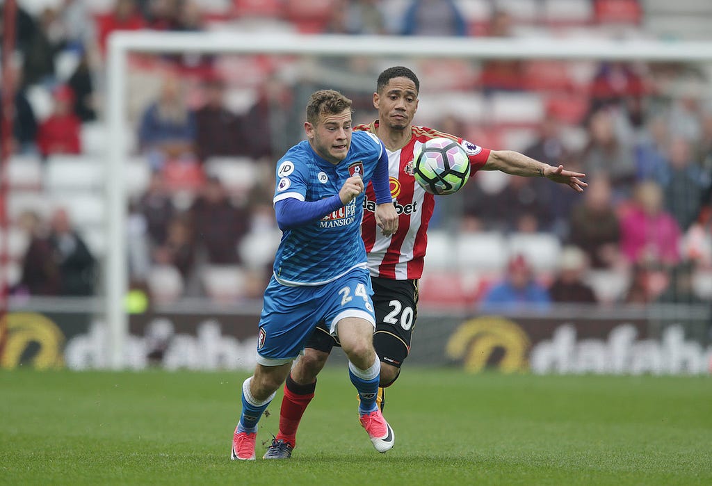 Ryan Fraser of Bournemouth and Steven Pienaar of Sunderland during the Premier League match between Sunderland and Bournemouth at the Stadium of Light, Sunderland on the 29th April 2017. Photo: Robin Jones