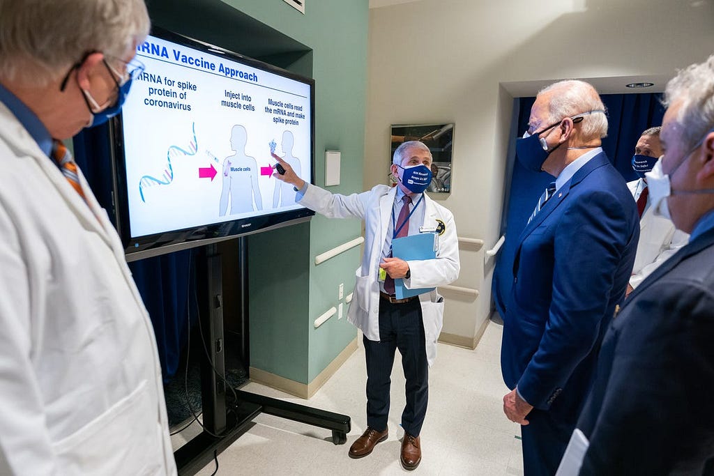 President Joe Biden receives a briefing from Dr. Anthony Fauci on Feb. 11, 2021, in Bethesda, Maryland.