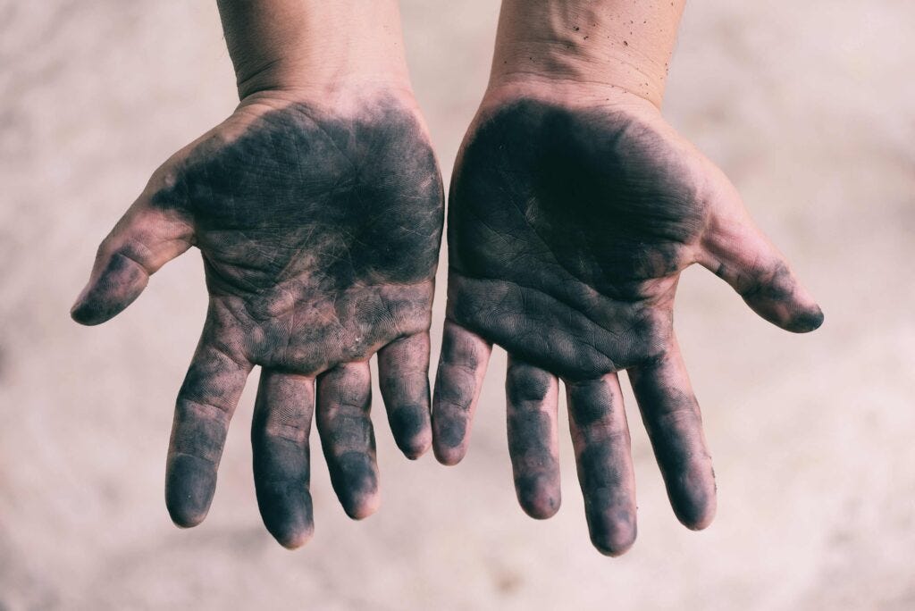 A pair of dirty hands.