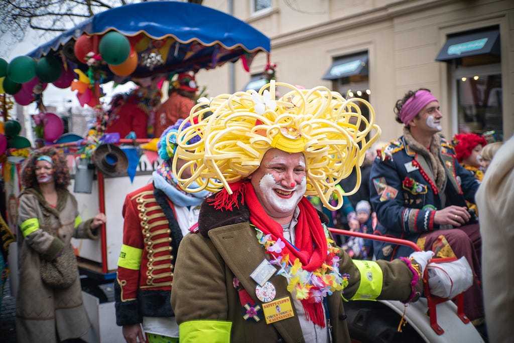 Adult man dressed as a clown during Dutch Carnival