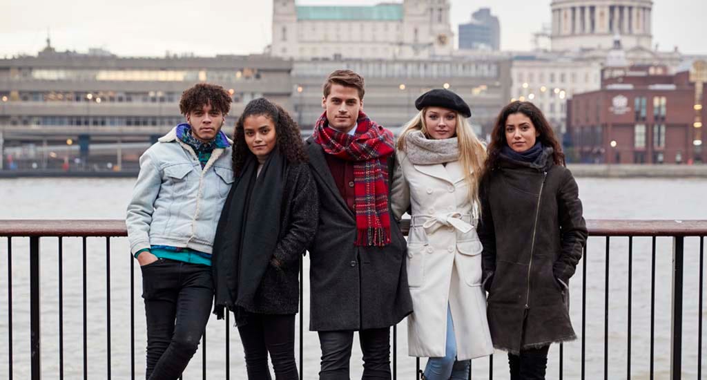Group of young entrepreneurs walking along South Bank in London