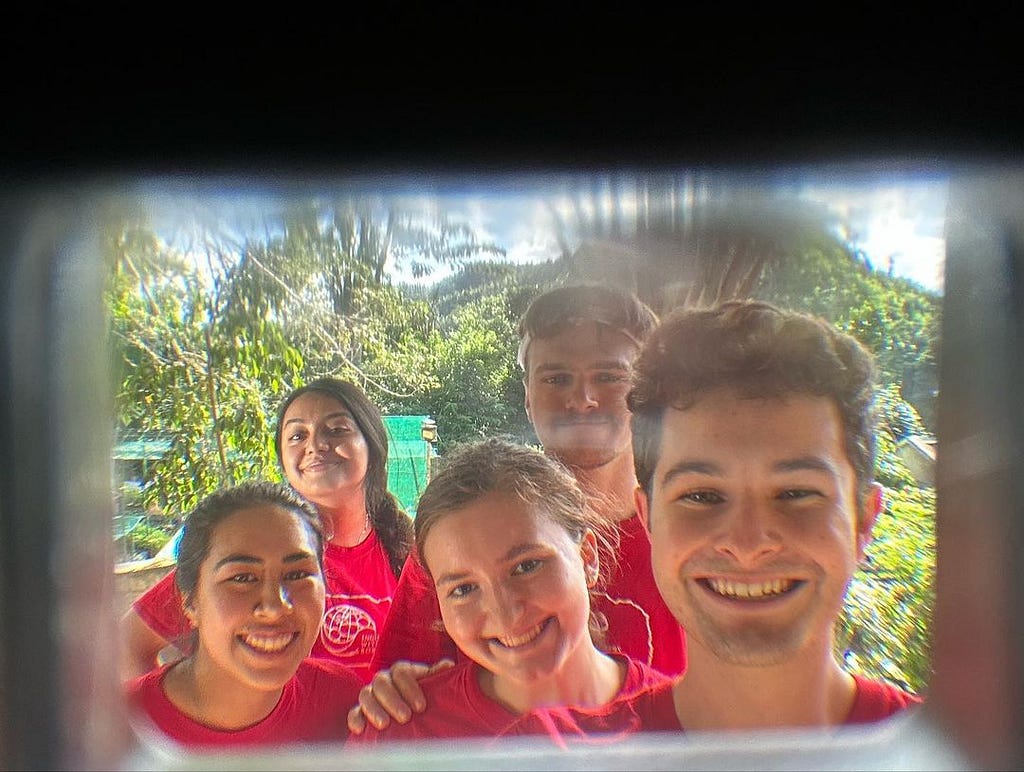 EWB members smile for a photo while working in Madagascar