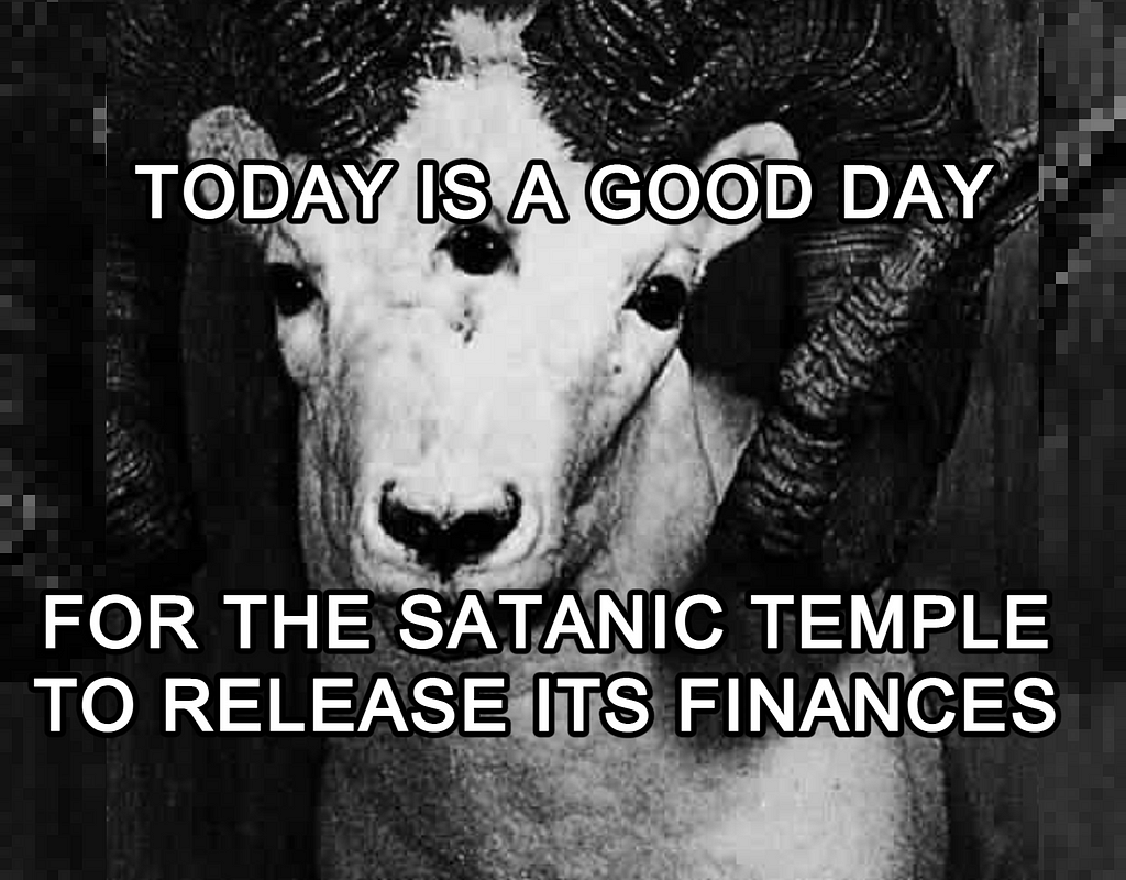 Black and white image of a three-eyed ram, sorta a stock occult image. Overlay text: “Today is a good day for The Satanic Temple to release its finances.”
