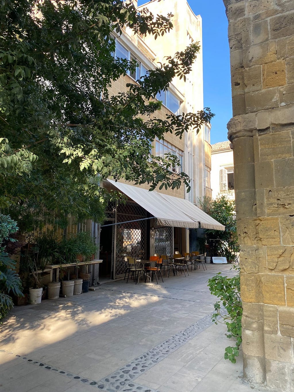 Image shows a cafe/bar in an old street in Nicosia, Cyprus