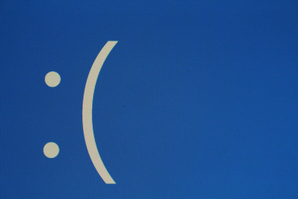 Blue screen with sad face — colon, bracket