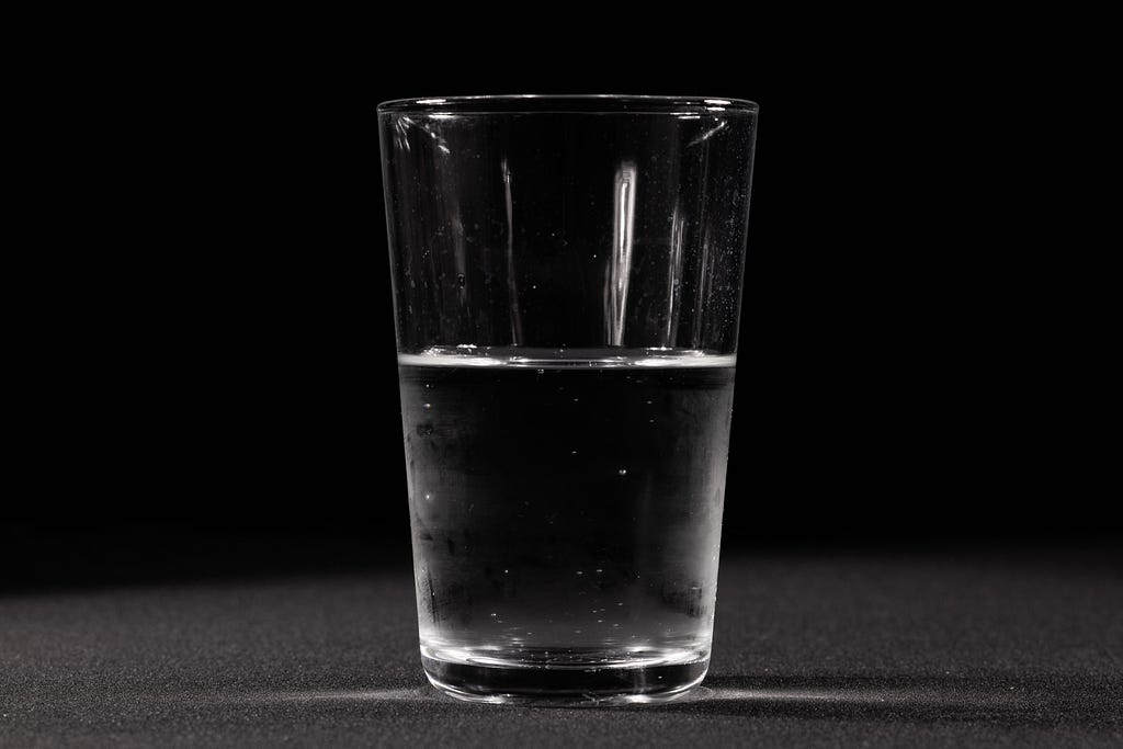 A glass half full of water, or half empty