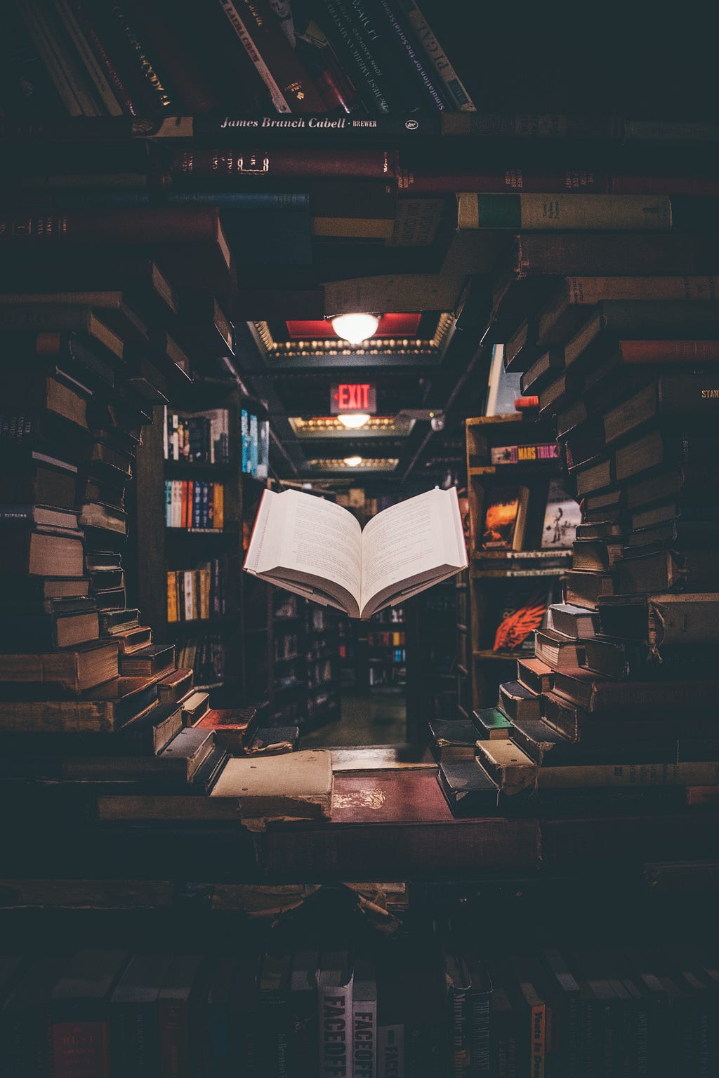 a bookstore with a book on a reading podium in the middle