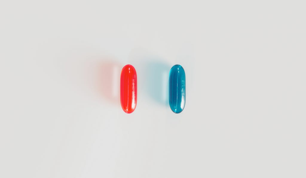 Two pills one red and the other blue