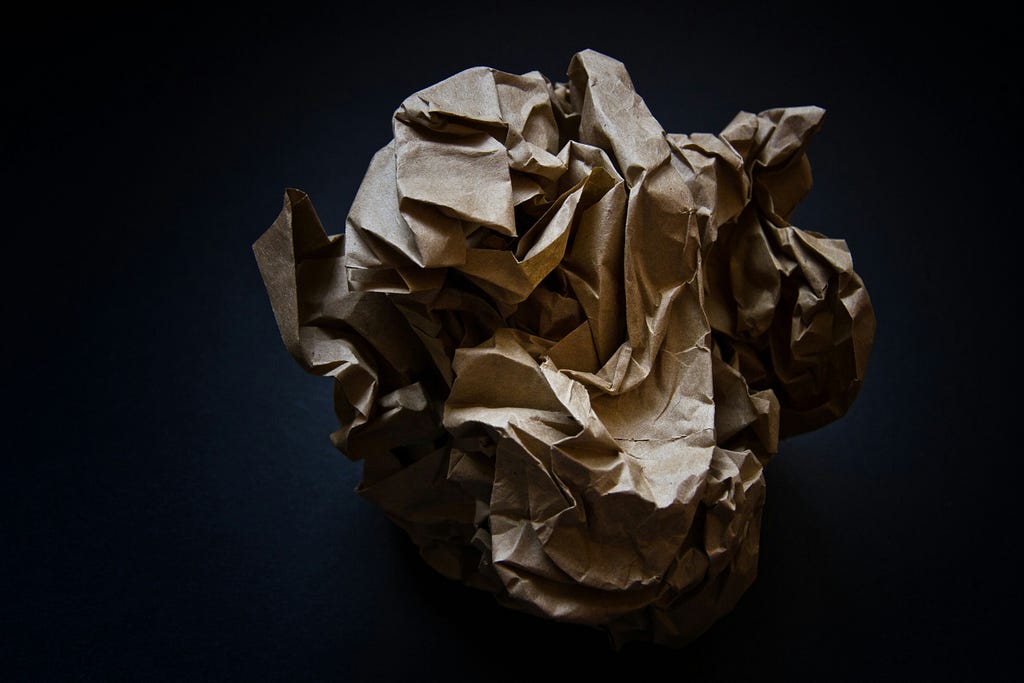 Paper scrunched up into a ball.