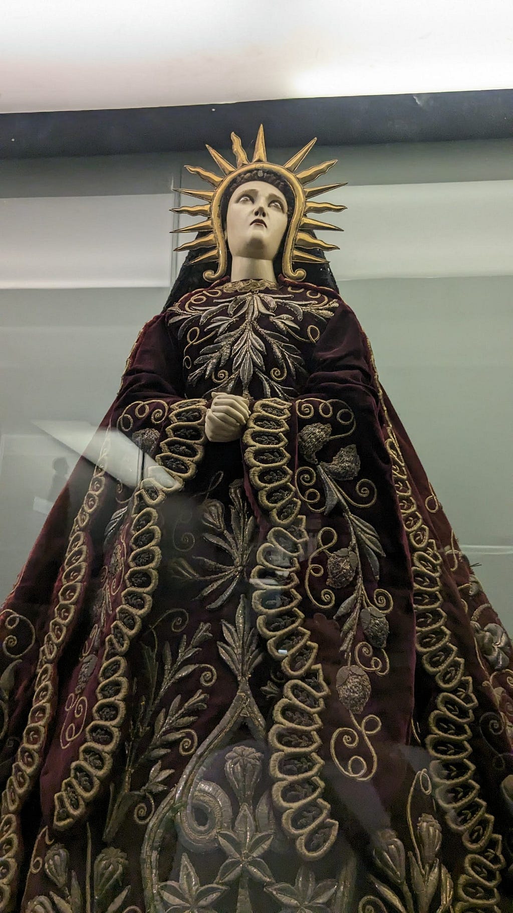 A regal statue of the Virgin Mary