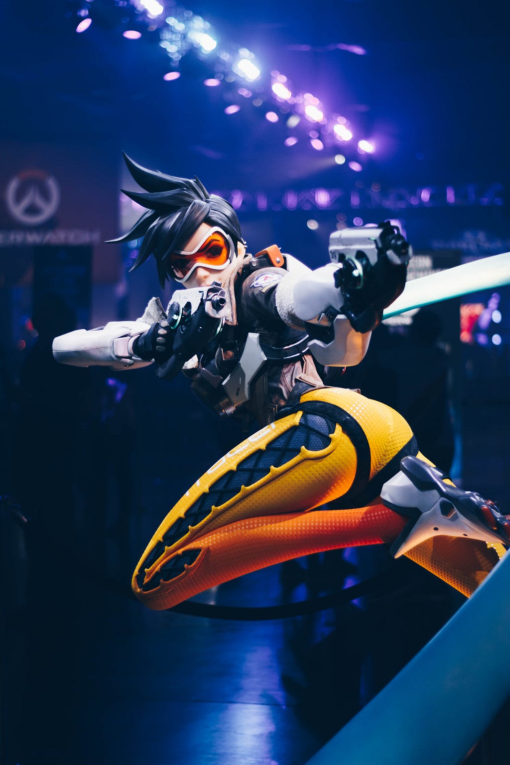 A picture of an Overwatch woman sentinal taking aim.