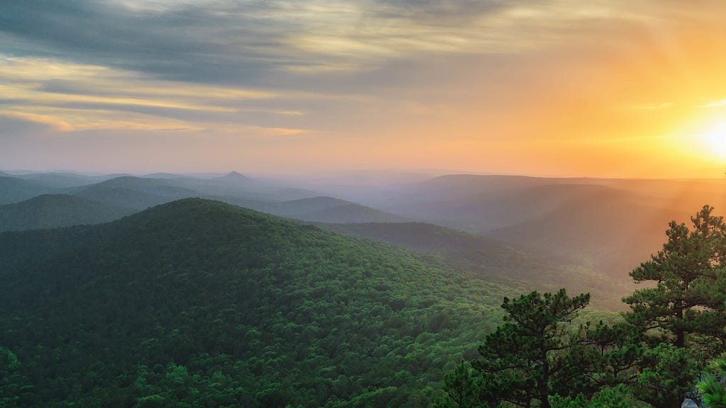 The view west from Flatside Pinnacle across the Ouachitas toward Forked Mountain at sunset.