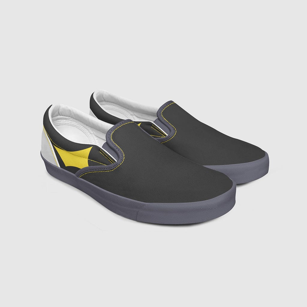 A mockup of a pair of dark grey shoes against a white background, with minimalist yellow graphics on the shoes