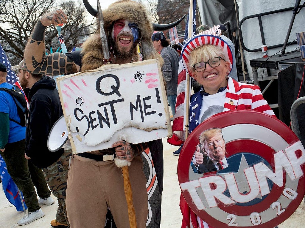 Trump supporter and QAnon follower Jake “The Q Shaman” Angeli, real name Jacob Anthony Chansley, attends a “Stop the Steal” rally.